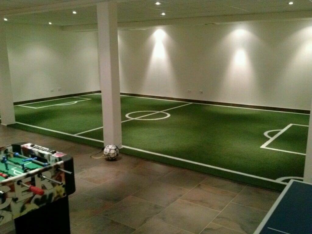 Indoor artificial athletic grass installation
