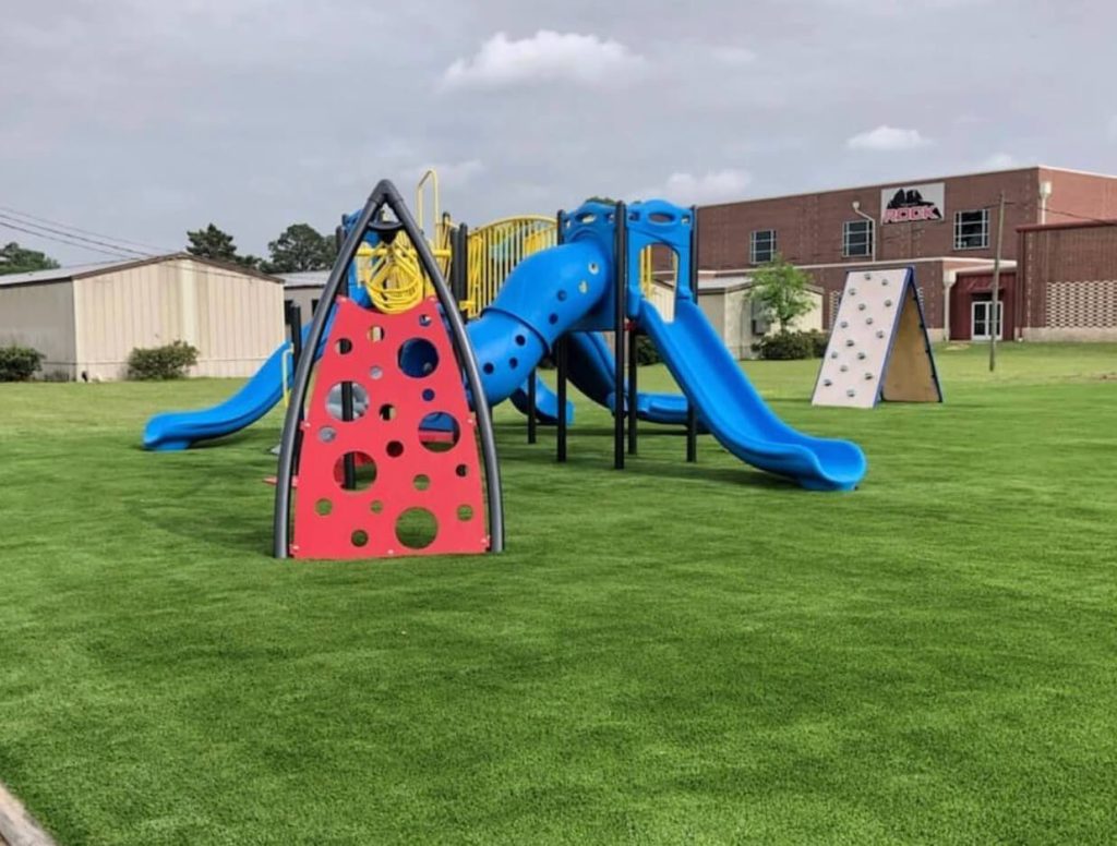 Artificial grass playground installation from Premiere Greens