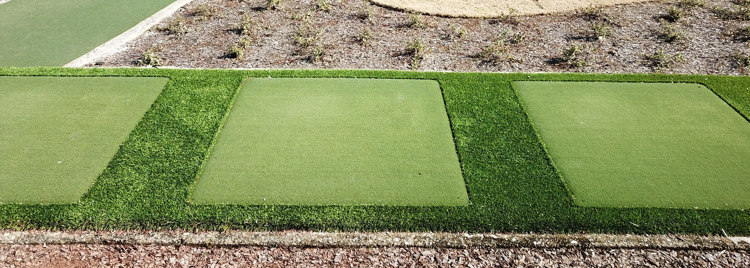 Golf tee boxes with Premier Greens artificial grass