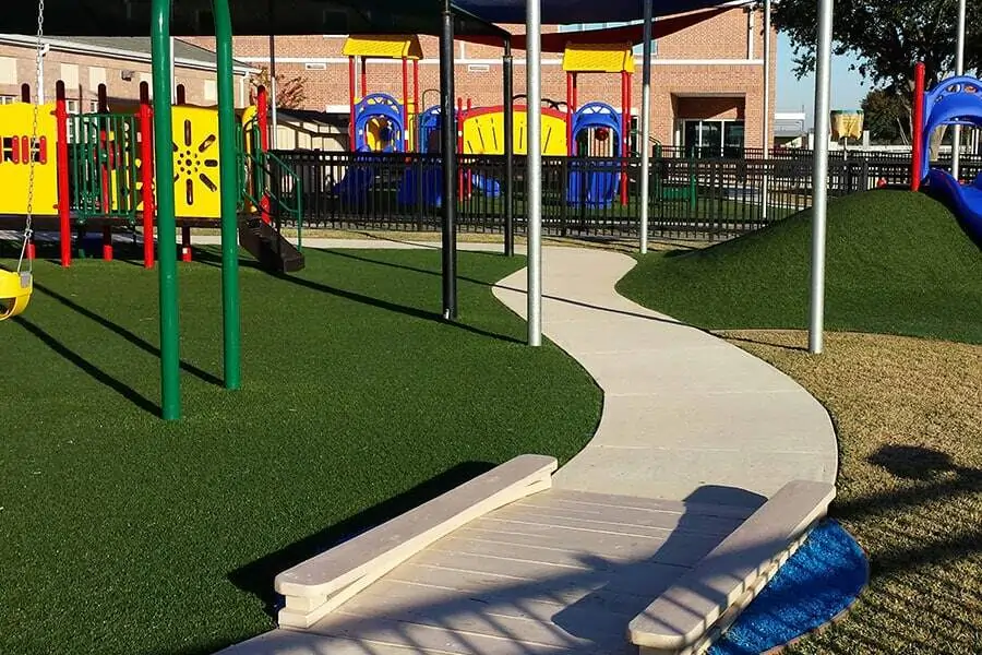 Artificial grass playground installed by SYNLawn