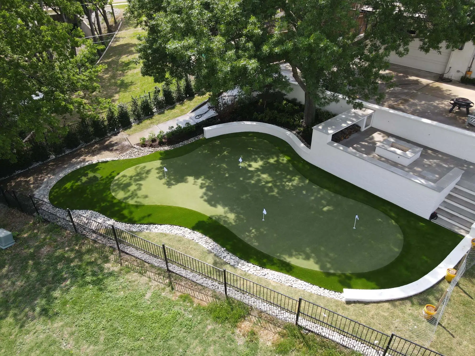 Backyard golf green installed by SYNLawn